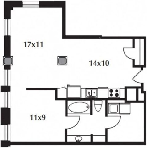 B10 Floor Plan The floor plan includes a kitchen, living area, bedroom, and bath.