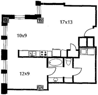 B20 floor plan #1101 The floor plan includes a kitchen and living area, bedroom, and bath. No door on bedroom.